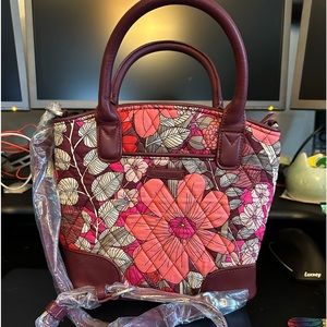 Small purse by Vera Bradley. New with tags. Never been used.